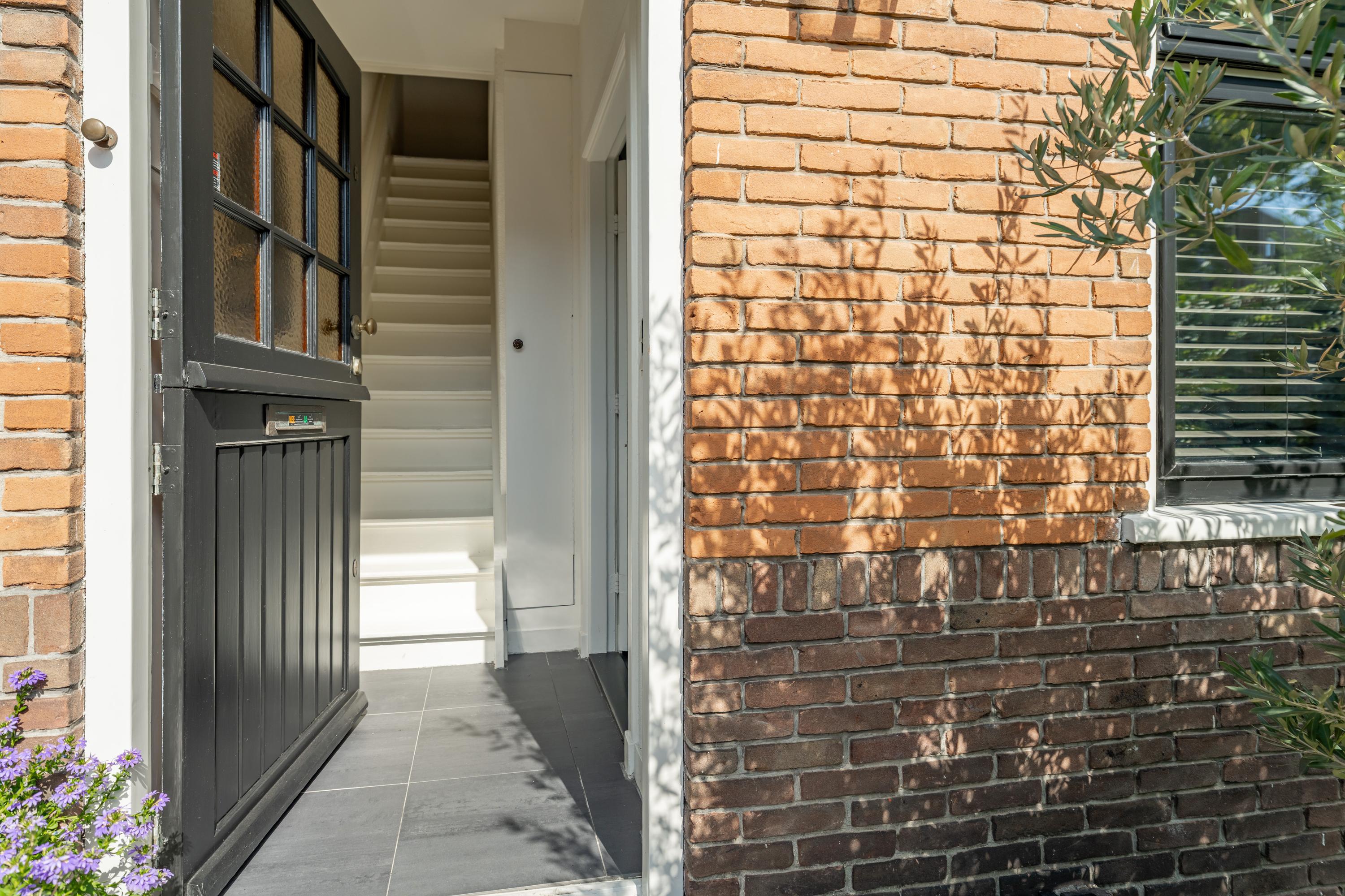 Tussenwoning te koop: Hulweg 42, Huizen