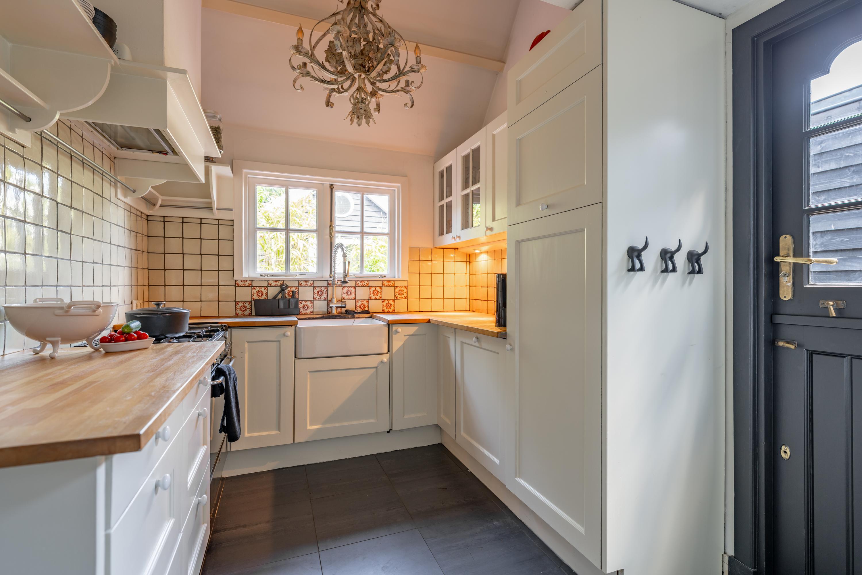 Tussenwoning te koop: Hulweg 42, Huizen