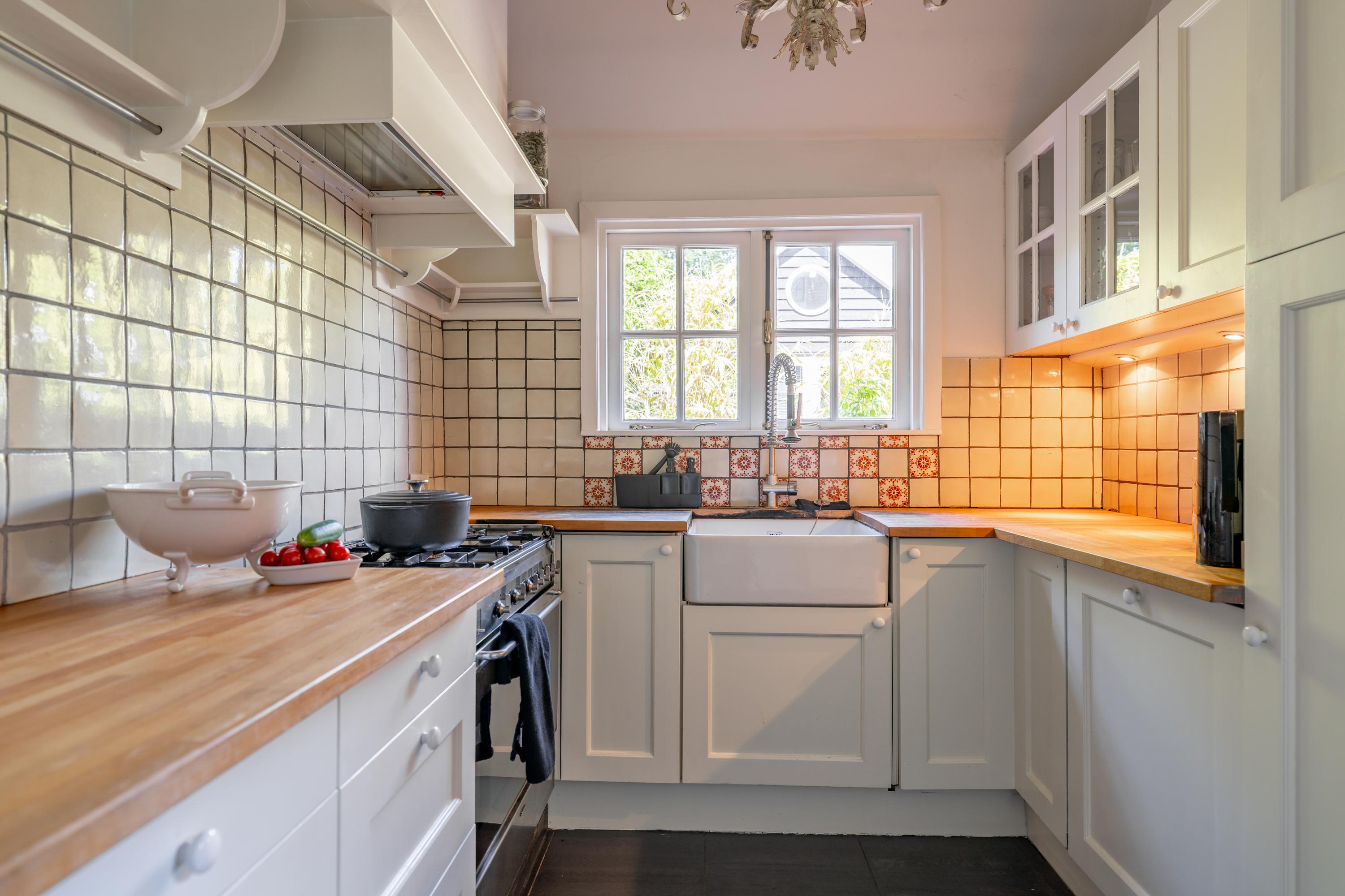 Tussenwoning te koop: Hulweg 42, Huizen