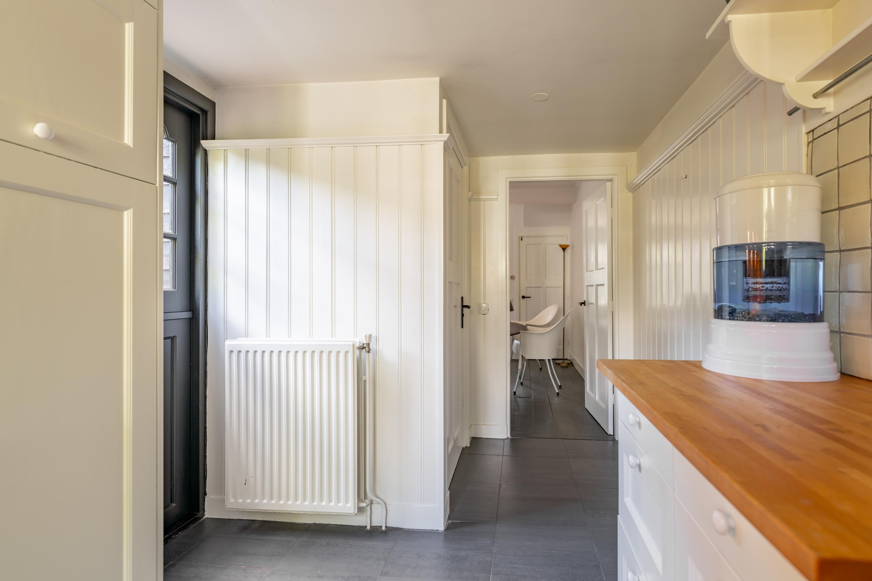 Tussenwoning te koop: Hulweg 42, Huizen