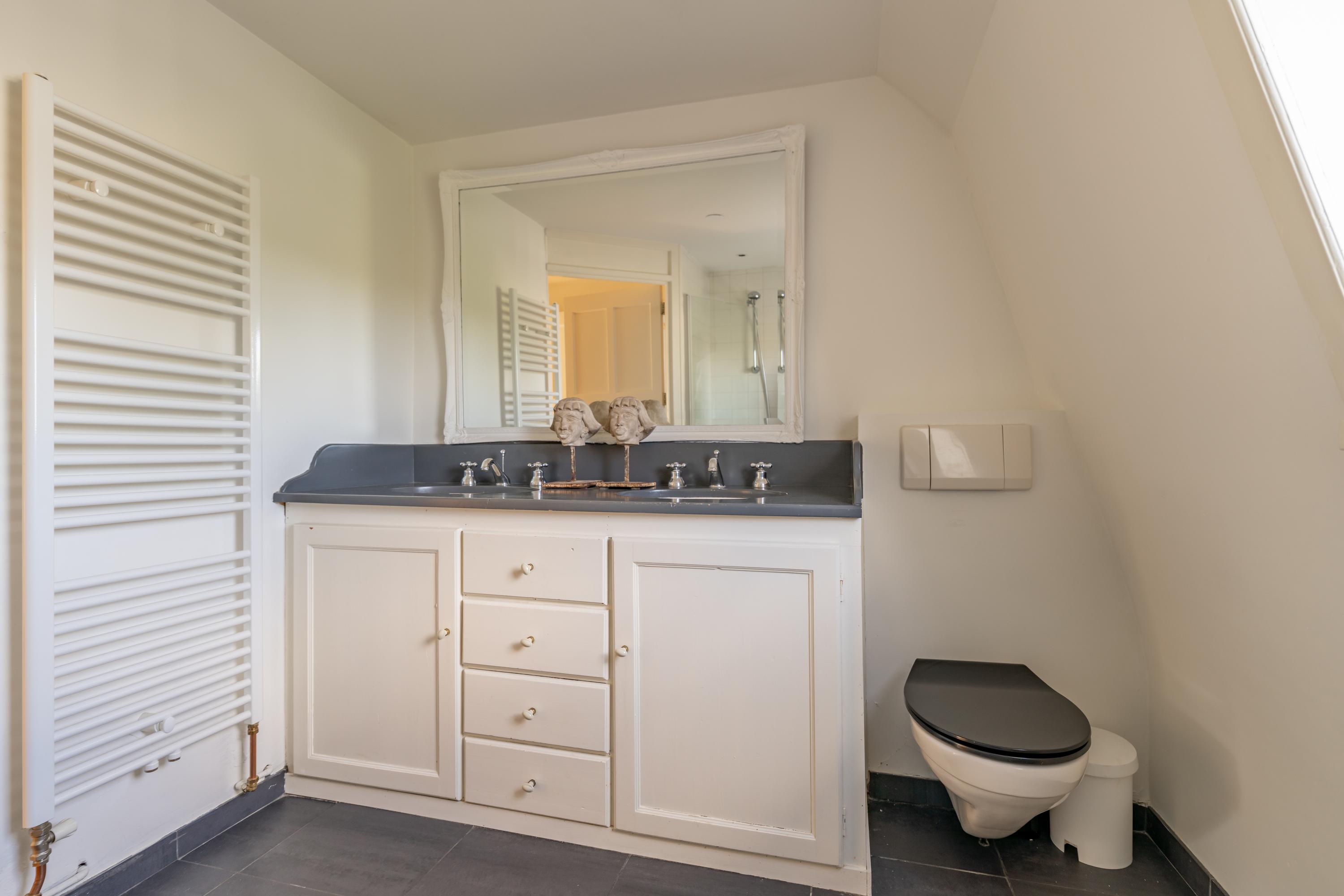 Tussenwoning te koop: Hulweg 42, Huizen