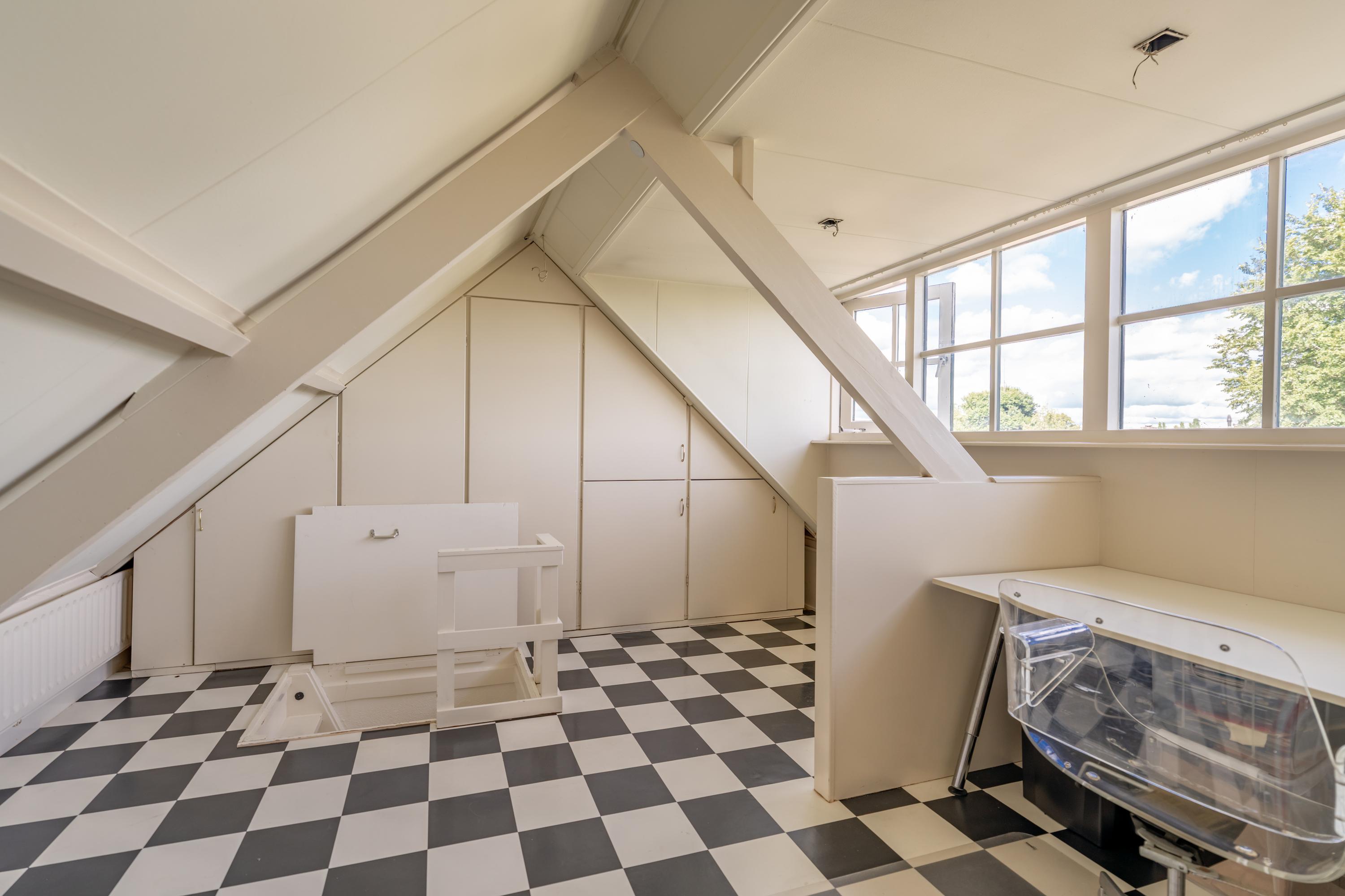 Tussenwoning te koop: Hulweg 42, Huizen